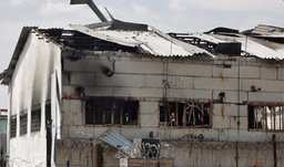 En barack som förstörts i attacken i Oljonivka.