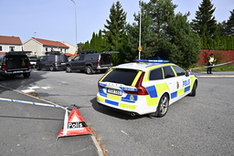 Polis på plats efter våldsdådet i Vallentuna norr om Stockholm i september 2023.