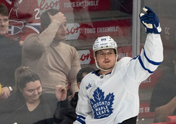 Toronto Maple Leafs' William Nylander (88) celebrates his goal over the Montreal Canadiens during third period NHL hockey action in Montreal on Saturday, Jan. 18, 2025. (Christinne Muschi/The Canadian Press via AP) CMU113